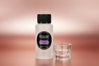 Bottle of Rosalind acrylic liquid with measurements and a close-up of the liquid in a glass.