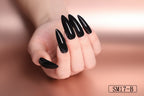 Hand with black nail polish on a plain background