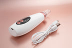 Blackheads removal white electronic device with control panel and USB cable on a white background