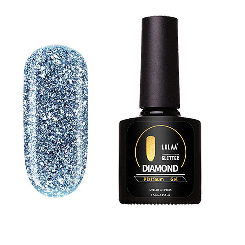 A bottle of Lula brand nail polish with a glitter diamond effect, labeled as 'Glitter Diamond'.