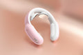 Close-up view of pink intelligent cervical neck massager 
