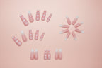 "Close-up view of pink cloud nails in press-on set."