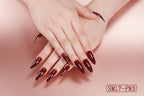 Close-up of hands with dark red nail polish on a light background
