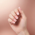 Set of pink nail tips with white tips on a white background