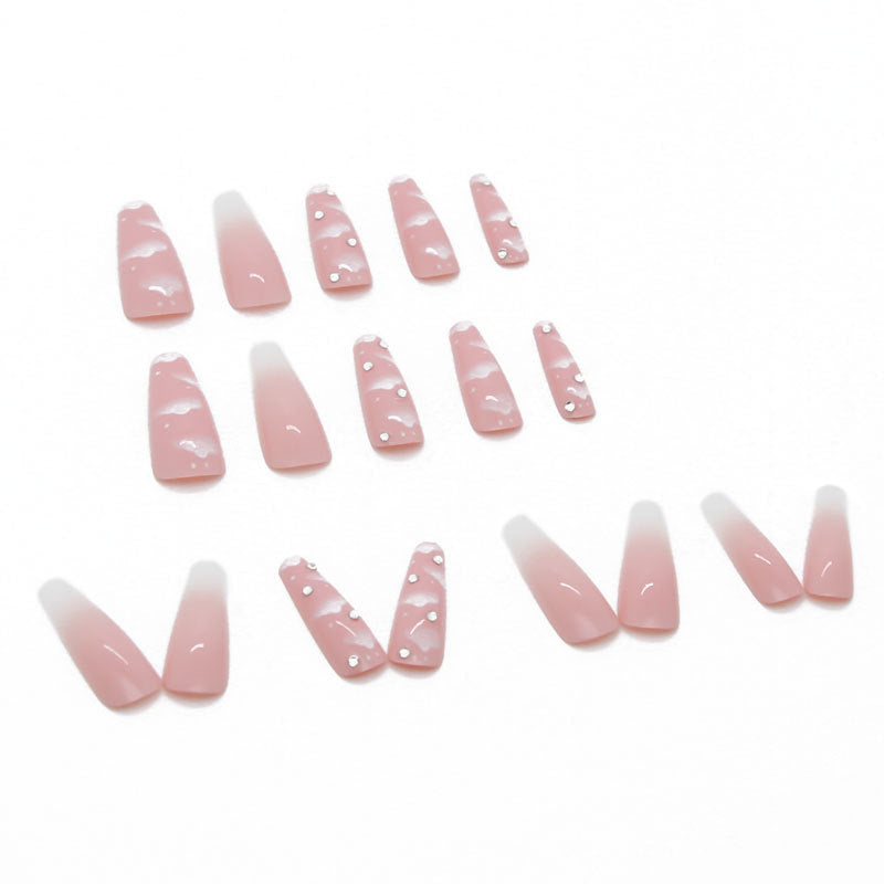 Pink cloud press on nails set with nails tools.