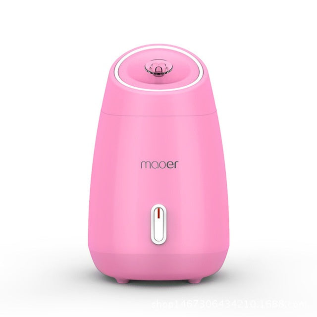 Pink humidifier with 'maoer' branding on a white background