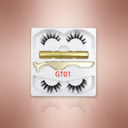 A set of magnetic eyelashes presented in a pink box with a pair of scissors and a tube of magnetic eyeliner, alongside two trays containing false eyelashes.