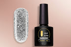 A bottle of Lula brand silver nail polish with a glitter diamond effect, labeled as 'Glitter Diamond'.