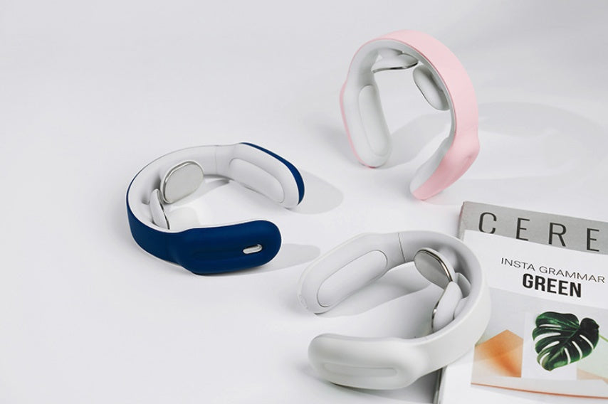 "Neck and shoulder massagers in pink, blue and white colors."