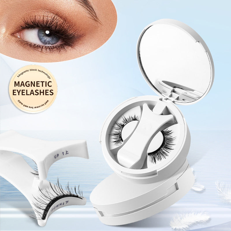 A white pod containing magnetic eyelashes with individual lash strips displayed in a circular arrangement. Includes an applicator tool and a pair of eyes with eyelashes applied to demonstrate usage.